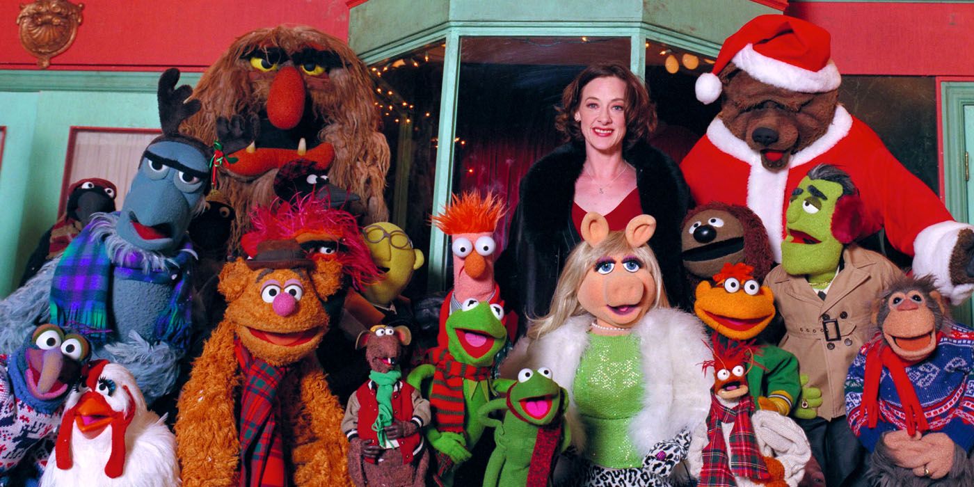 Joan Cusack and the cast of It's A Very Merry Muppet Christmas Movie