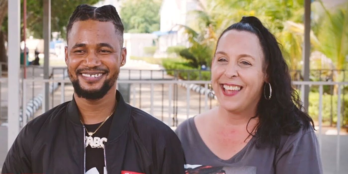 Kim Menzies and Usman Umar on 90 Day Fiancé Before the 90 Days smiling outside