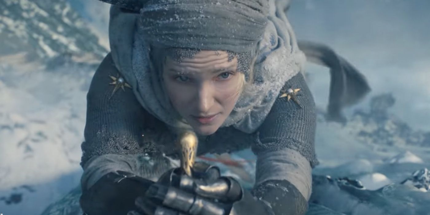 Galadriel climbing an icy mountain with a dagger in The Rings of Power