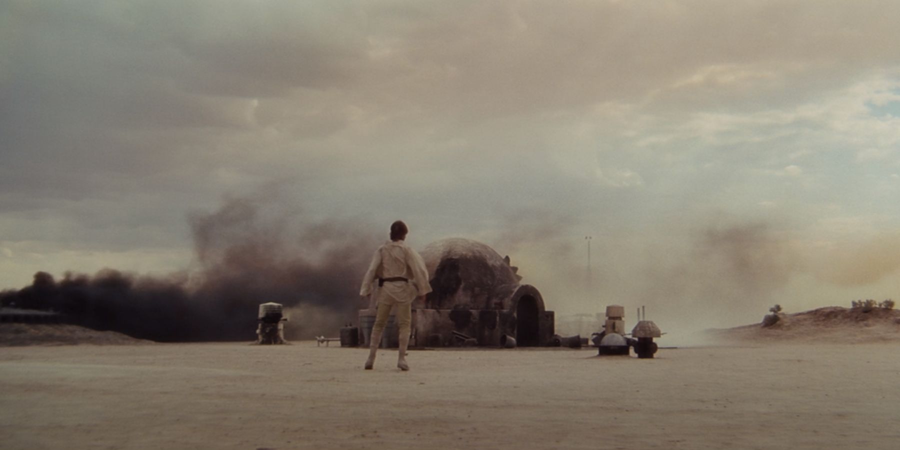 Luke Skywalker finding the ranch on fire in Star Wars A New Hope