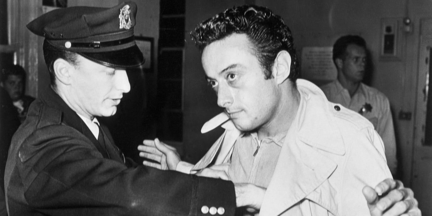 Lenny Bruce with a police officer.