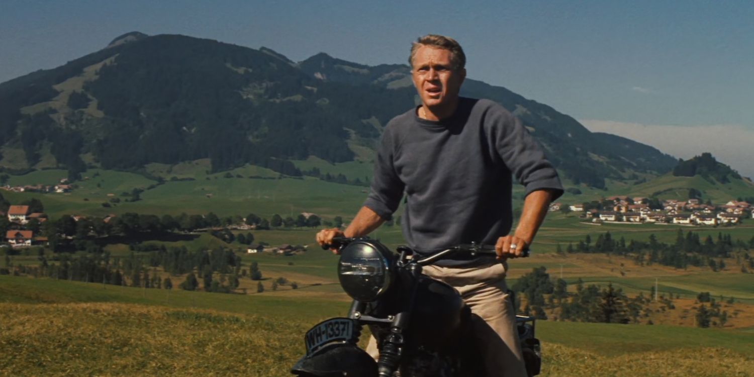 Steve McQueen riding a bike in The Great Escape