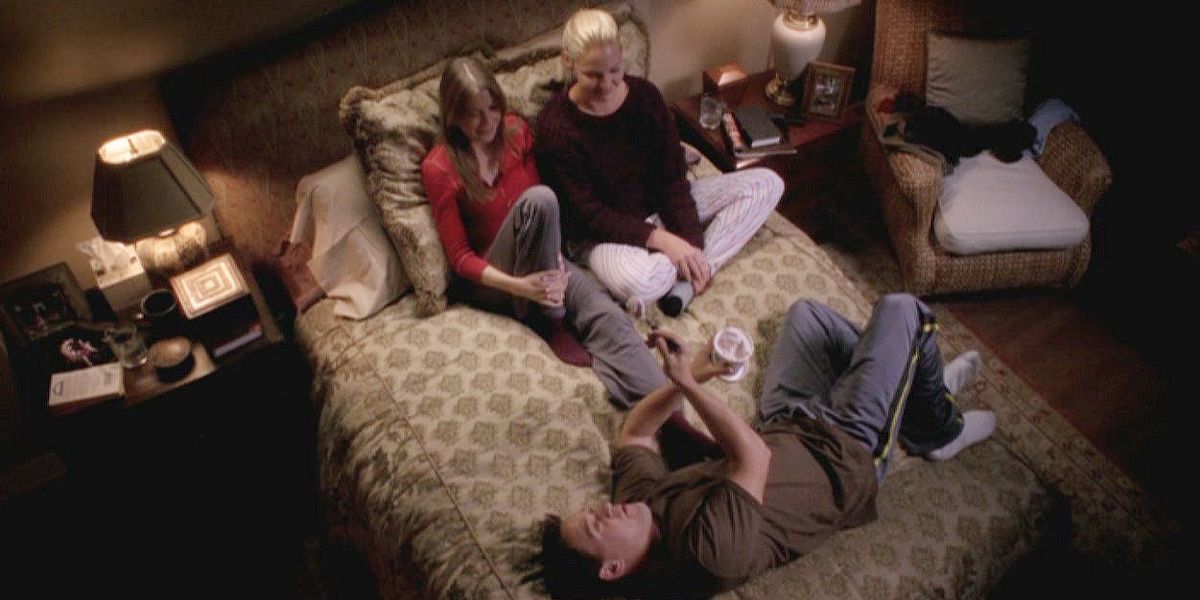 Meredith, Izzie and George On Grey's Anatomy, showed as they're sitting/lying on Meredith's bed in her house.
