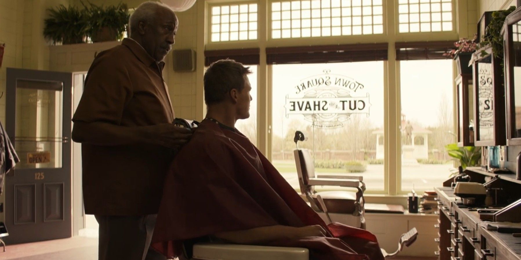 Mosley gives Reacher a shave in Reacher