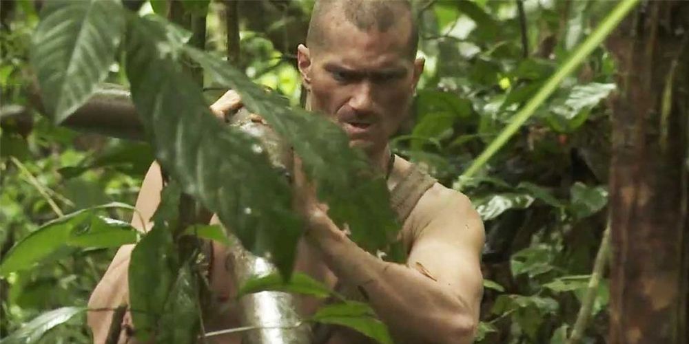 Shane treks through the jungle on Naked and Afraid