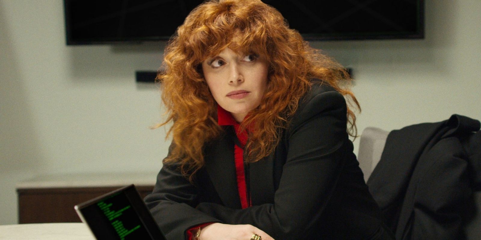 Nadia in the office in Russian Doll.