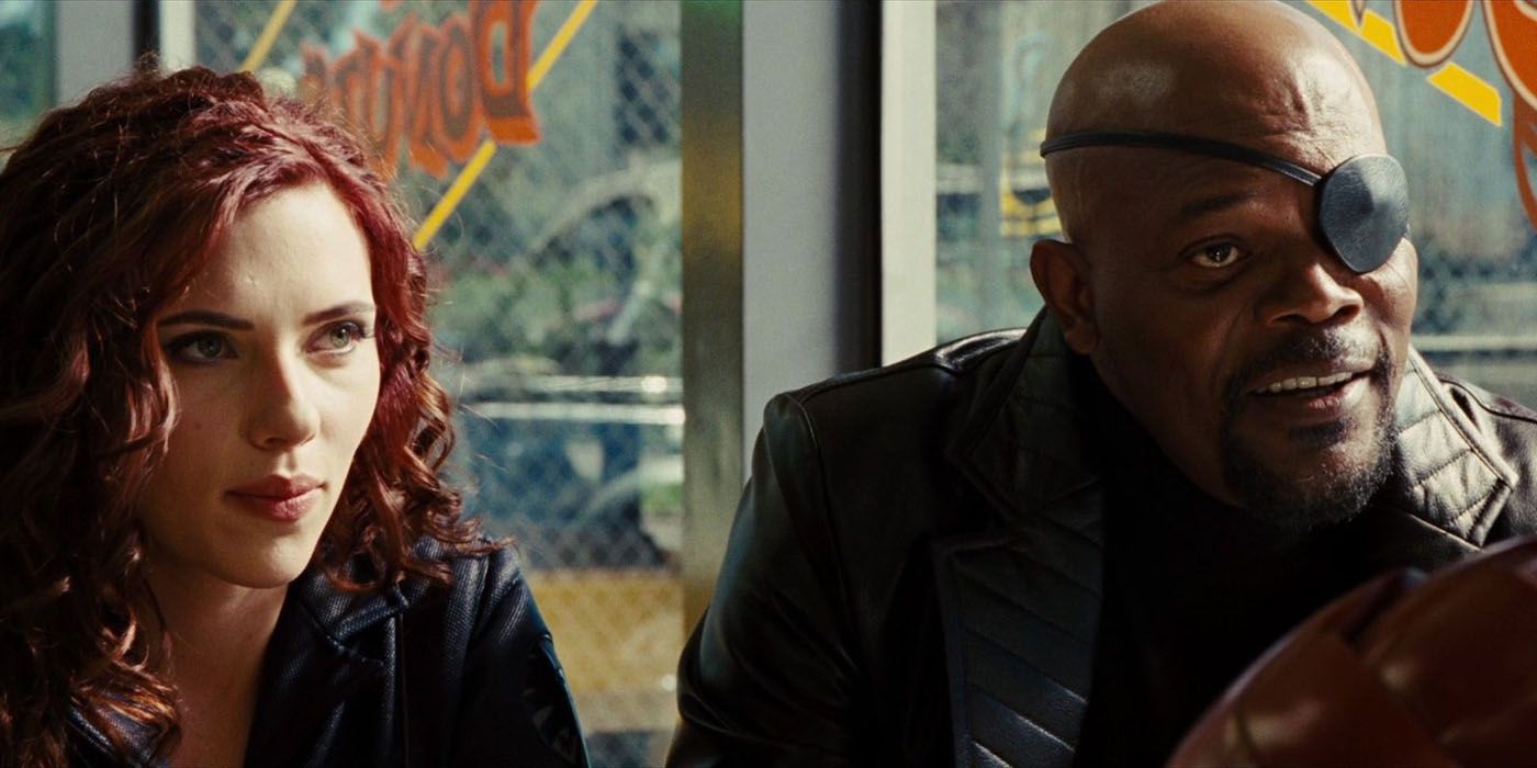 Nick Fury and Black Widow sitting in a diner.