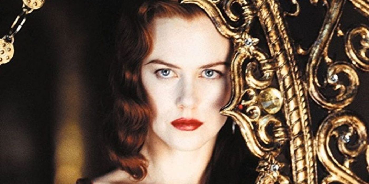 Nicole Kidman staring into a mirror in Moulin Rouge
