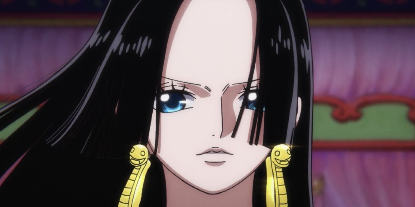 Hancock looking sombre with her hair blowing in her face in One Piece.