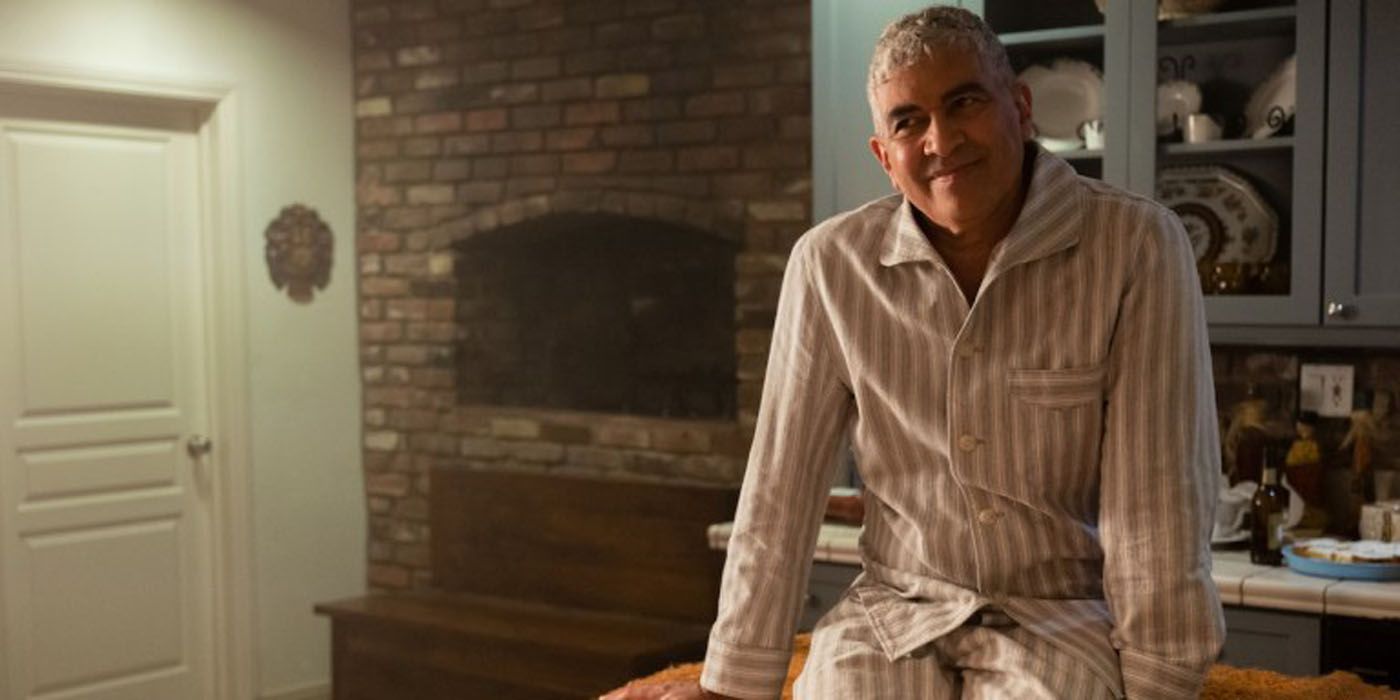 Pat Smear sitting in the kitchen.