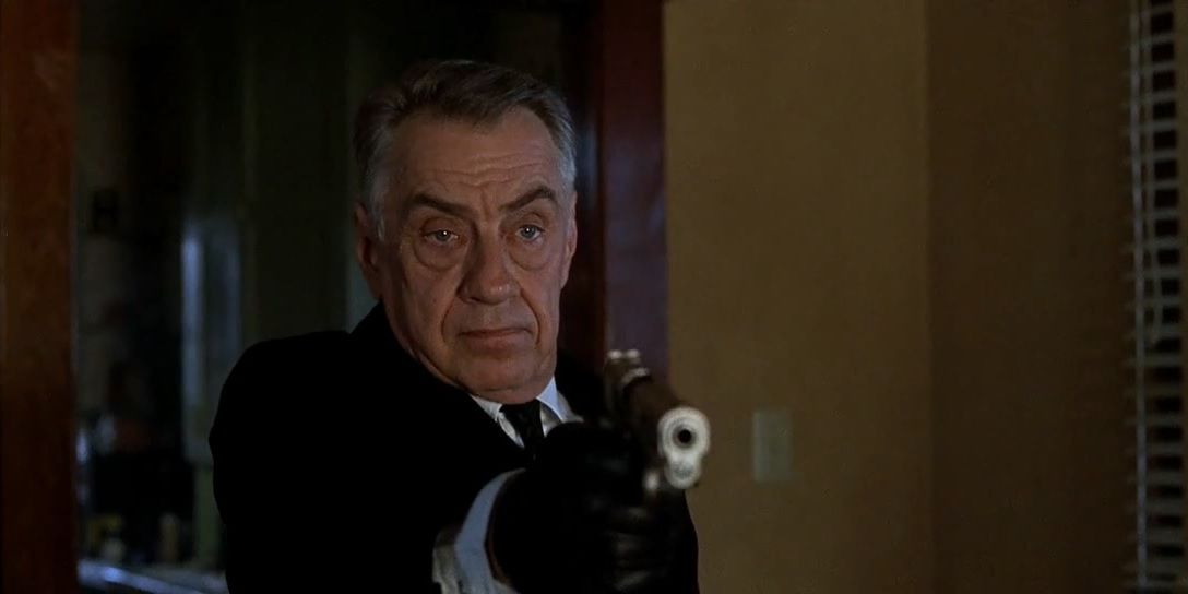 Philip Baker Hall holding a gun in Hard Eight