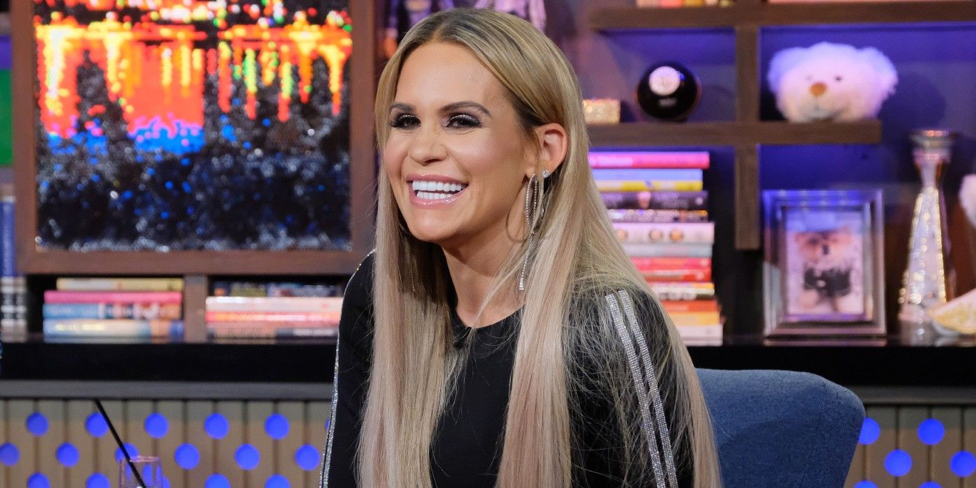 Jackie Goldschneider from RHONJ in a black top smiling at WWHL
