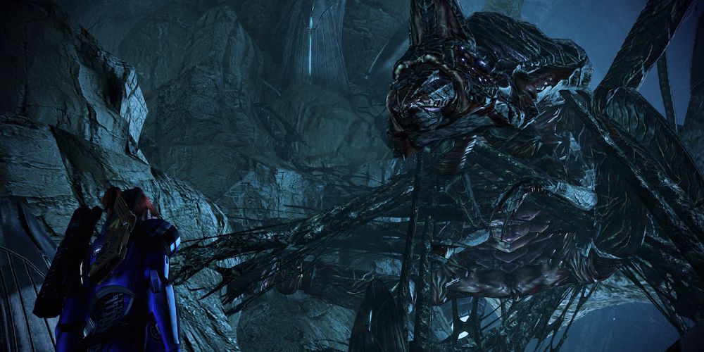 Rachni Queen ataca em uma caverna em Mass Effect Legendary Edition