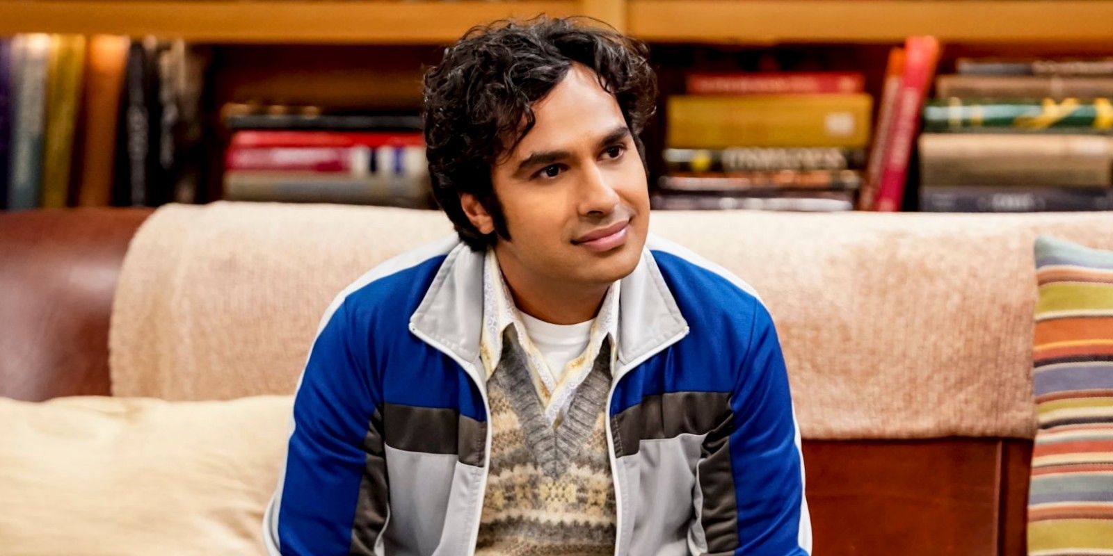 Raj smiling in the living room on The Big Bang Theory