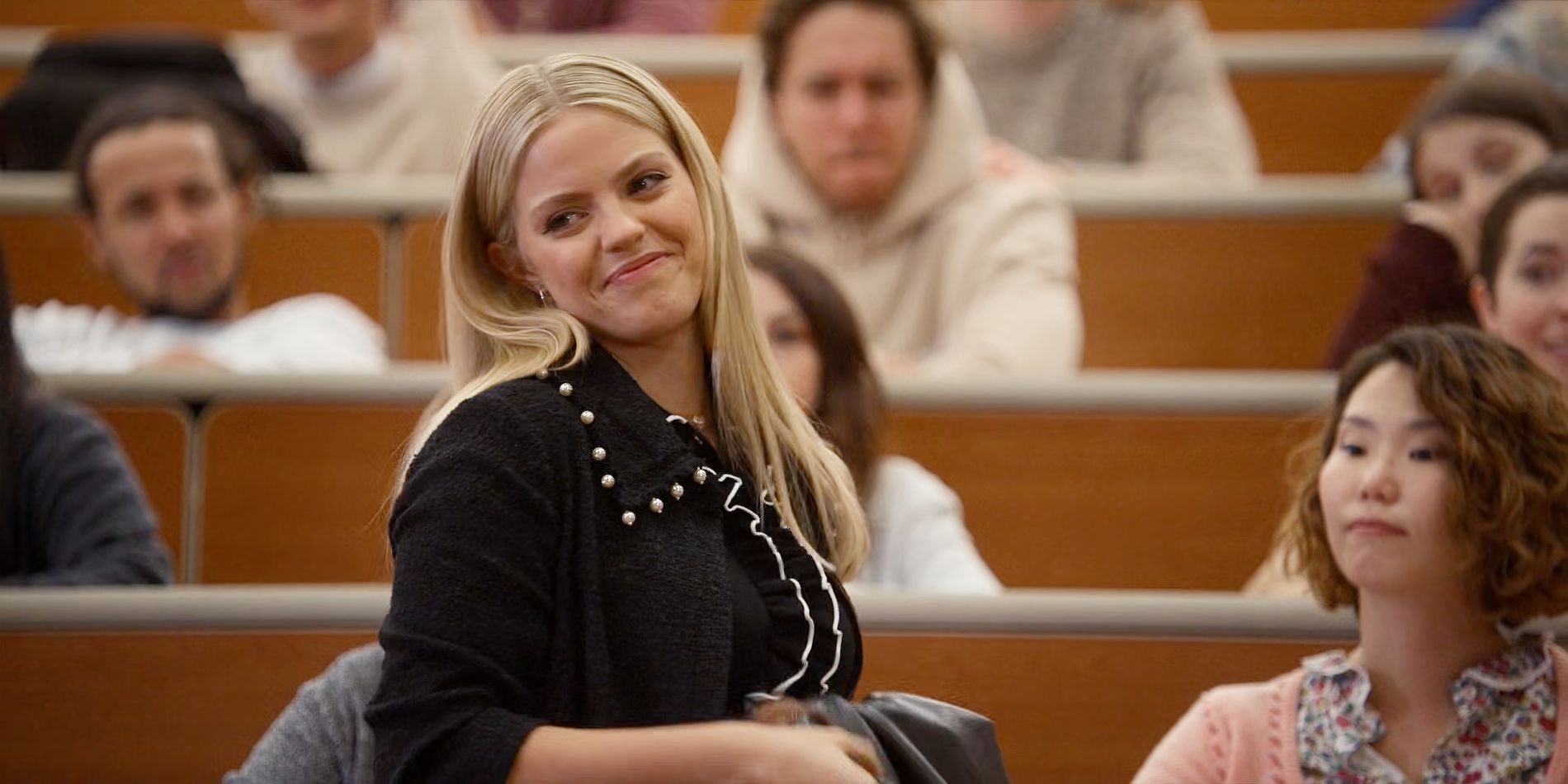 Renee Rapp as Leighton Murray in Sex Lives of College Girls in the classroom after the professor's announcement.