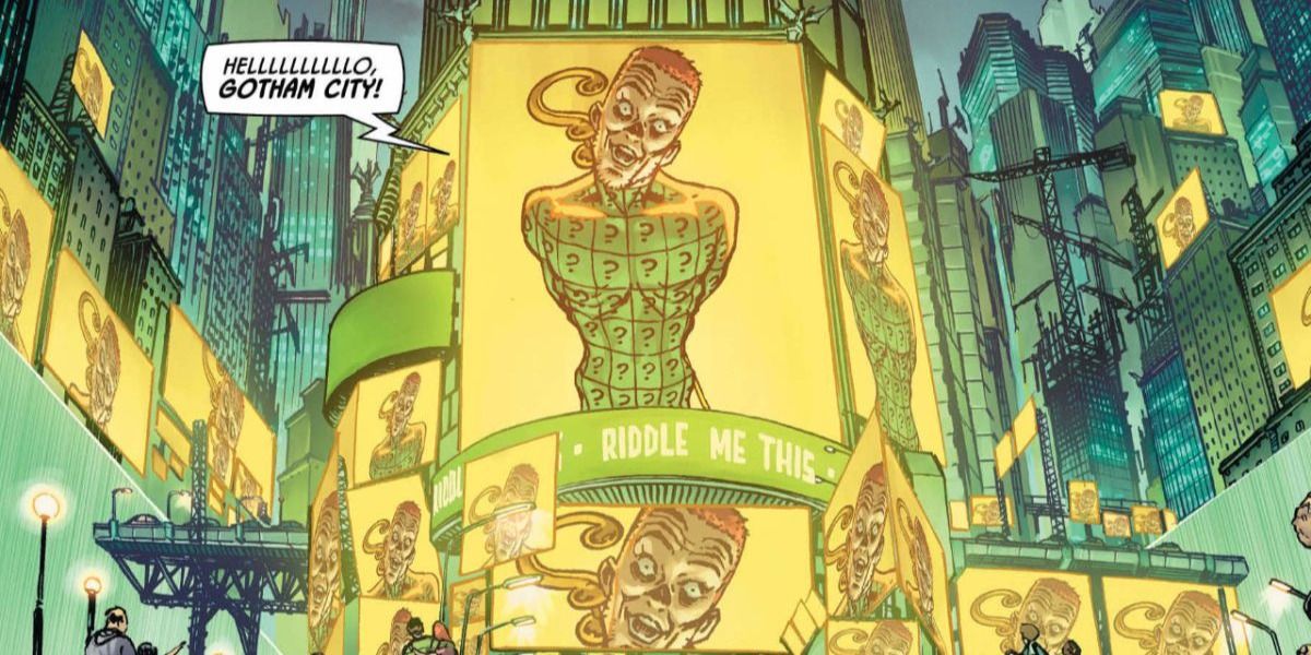 Riddler appearing on screens all over Gotham City during Their Dark Designs