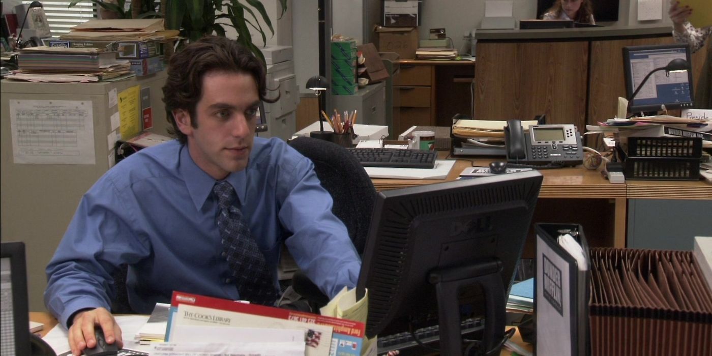 Ryan Howard on a computer on The Office