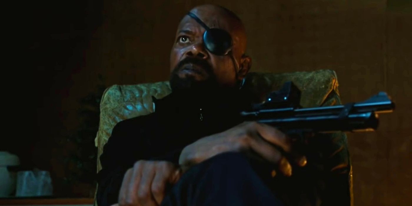Nick Fury holding a gun in Spider-Man Far From Home