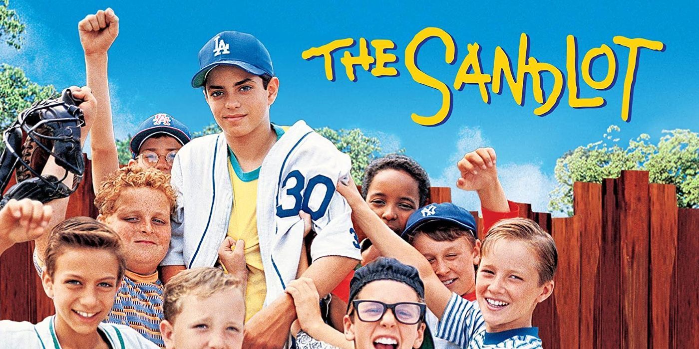 The Sandlot movie poster with the whole boy group lifting up one player enthusiastically