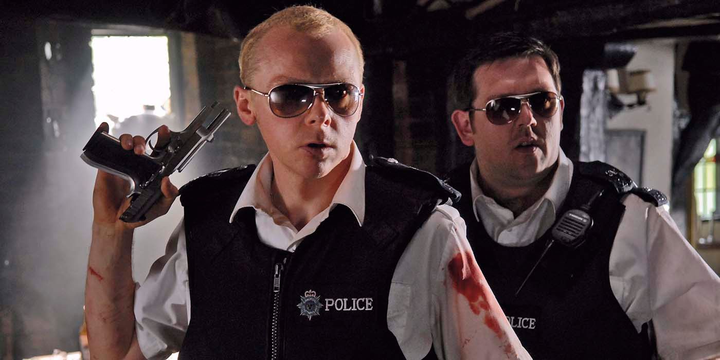 Simon Pegg and Nick Frost with guns in a pub in Hot Fuzz