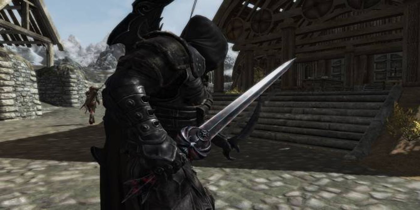 Caped and masked armored player holding nightingale blade in Skyrim