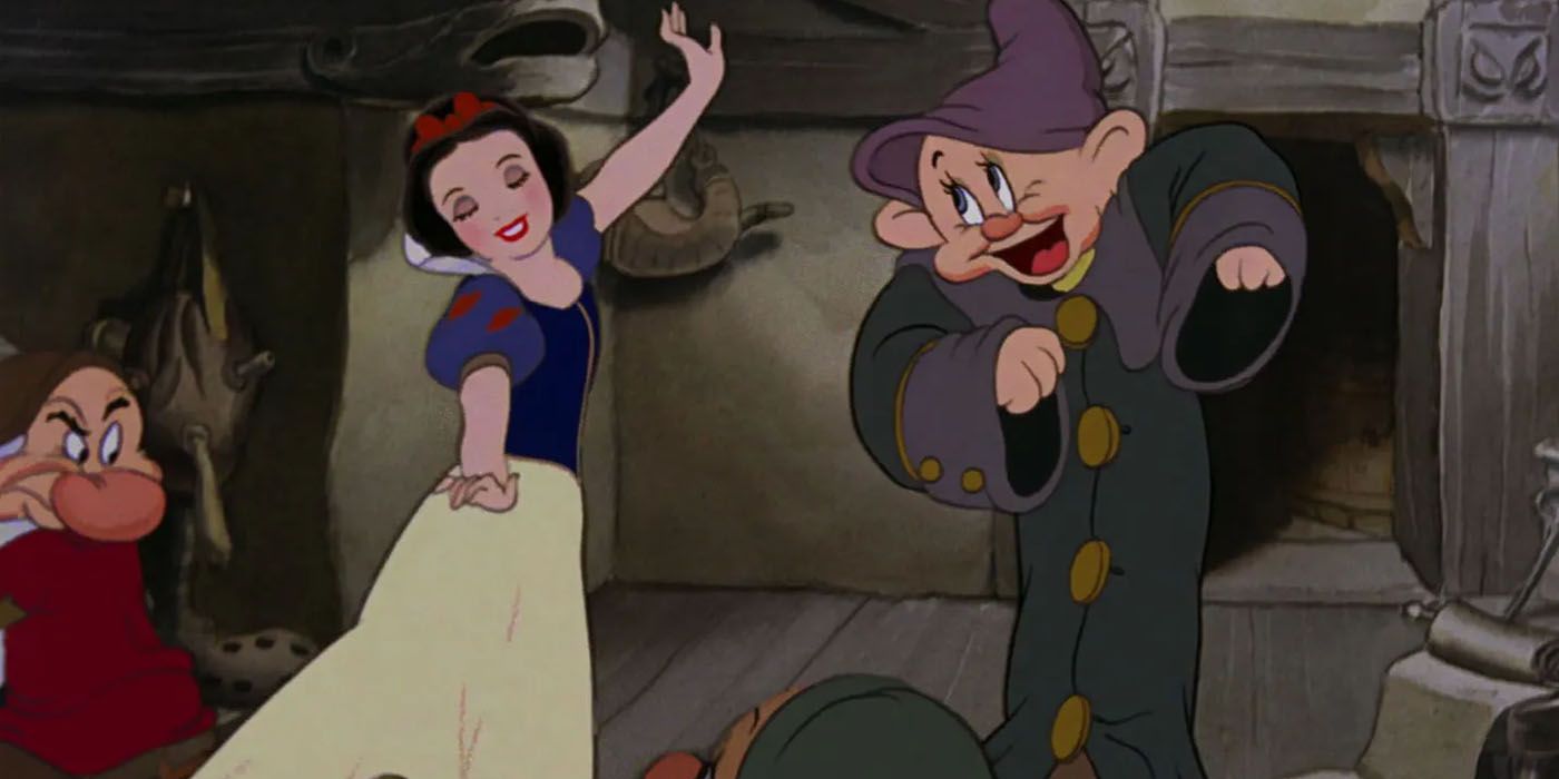 Snow White dancing with Dopey in Snow White and the Seven Dwarfs