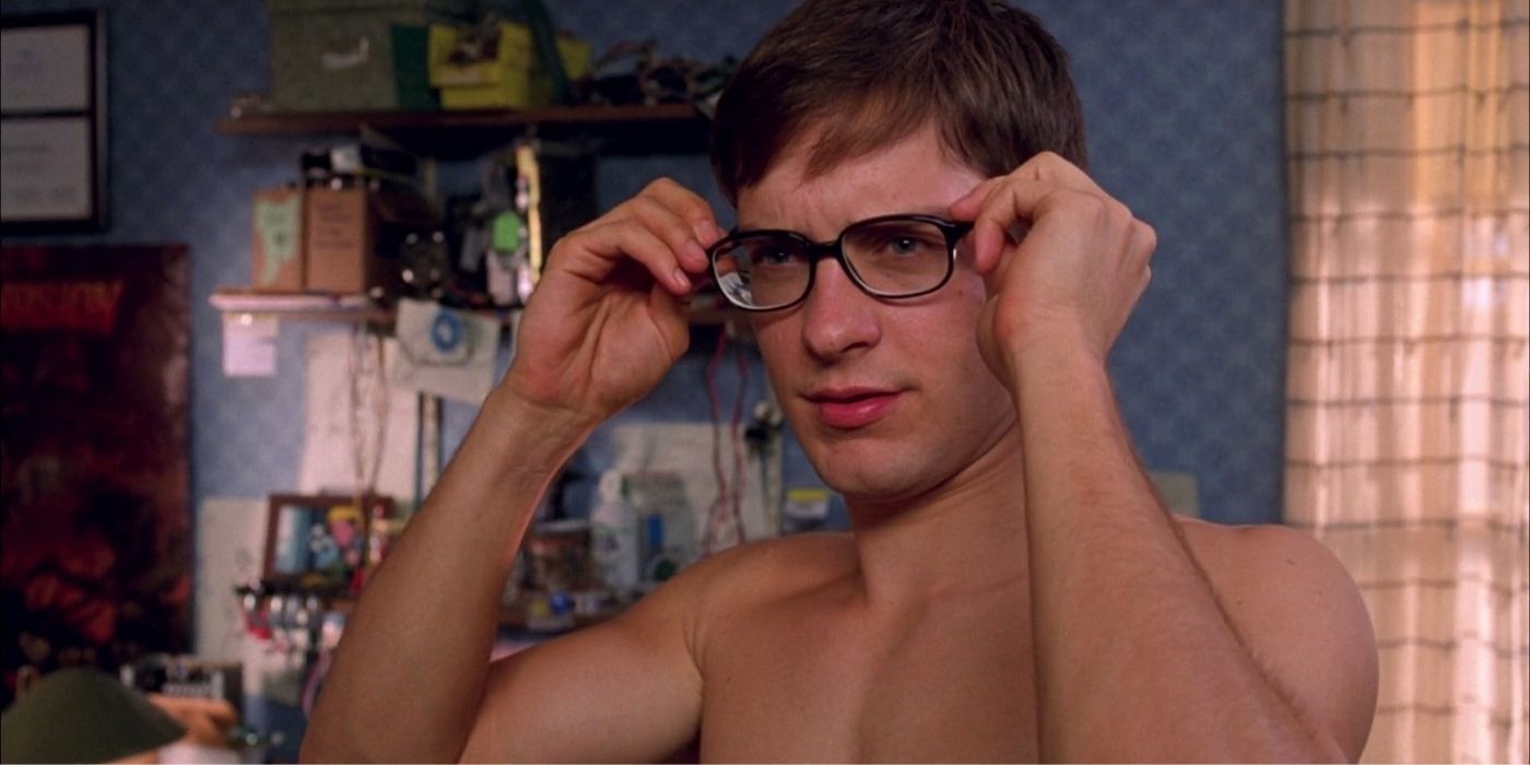 Peter Parker trying on his glasses in Spider-Man
