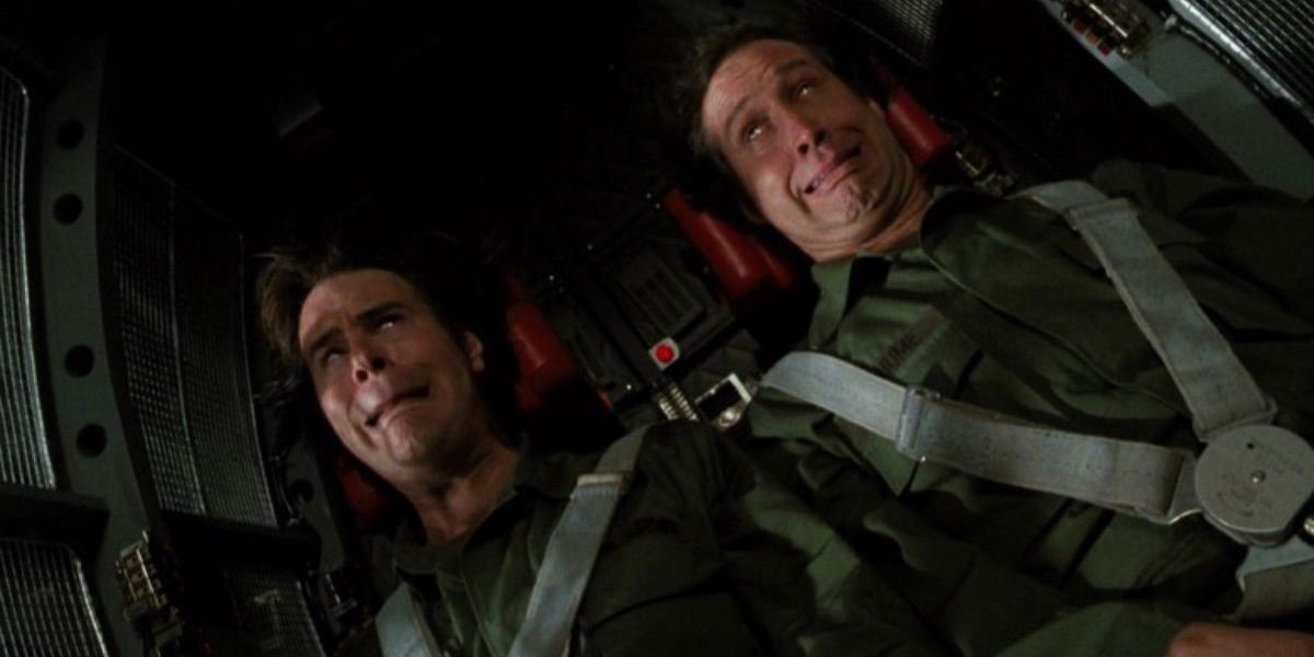 Dan Aykroyd and Chevy Chase ride a G-force simulator in Spies Like Us