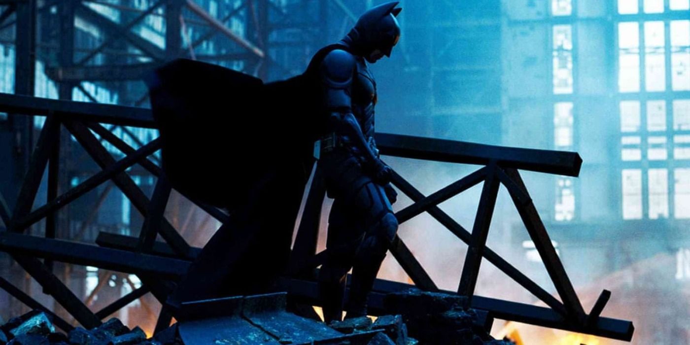 Batman mourning over the rubble where Rachel died in The Dark Knight
