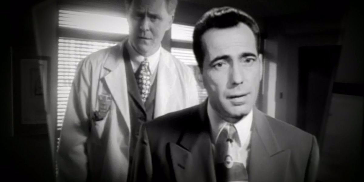 Humphrey Bogart looks on with his plastic surgeon from Tales from the Crypt