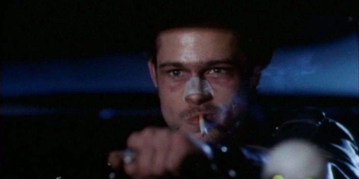Brad Pitt drives a sports car while smoking from Tales from the Crypt