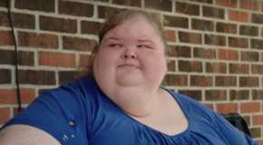Tammy Slaton in 1000-lb Sisters in blue dress smiling faintly