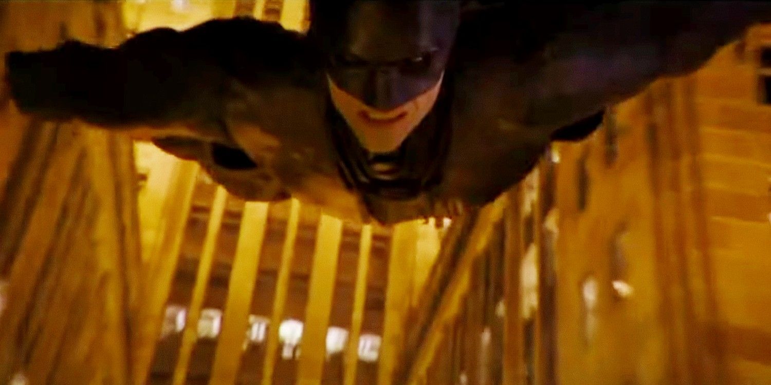 The Batman flying over Gotham City