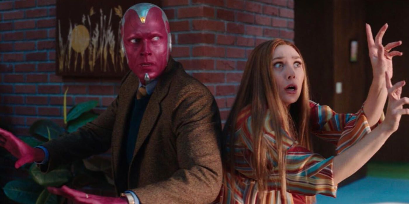 Wanda and Vision fighting side by side.
