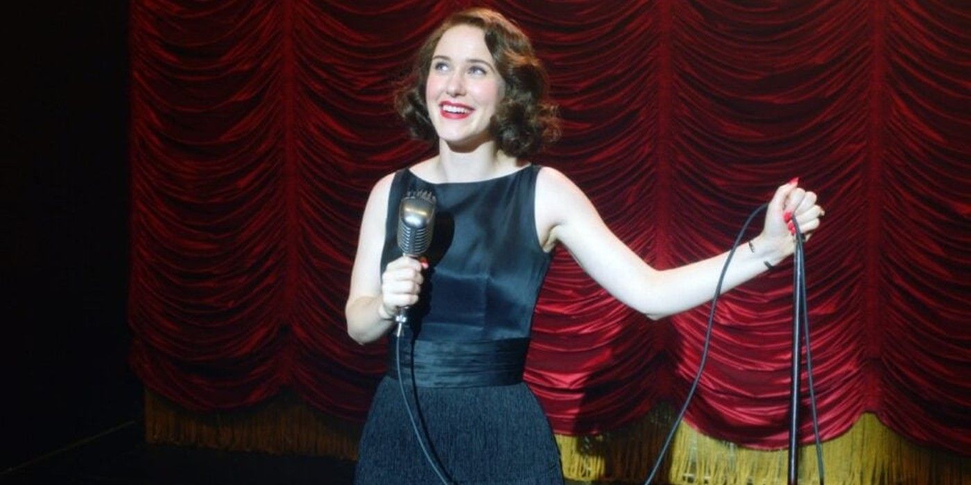 Amazon's Marvelous Mrs.Maisel star Rachel-Brosnahan standing on stage holding a microphone