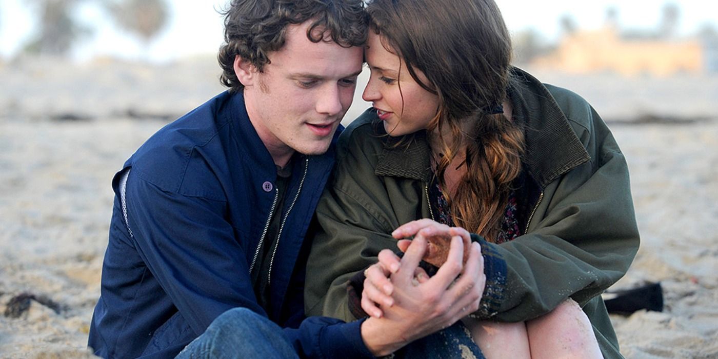 Anton Yelchin sits on the beach in Like Crazy.