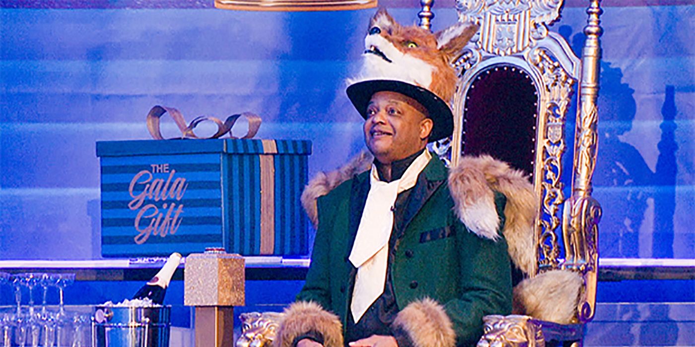 Todd Bridges sitting on a throne dressed as a king during a competition on Celebrity Big Brother.