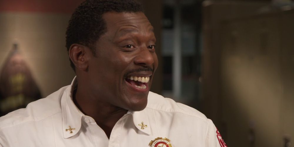 Boden smile in a white shirt on Chicago Fire