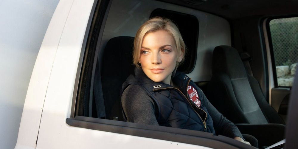 Sylvie rides in a squad car on Chicago Fire