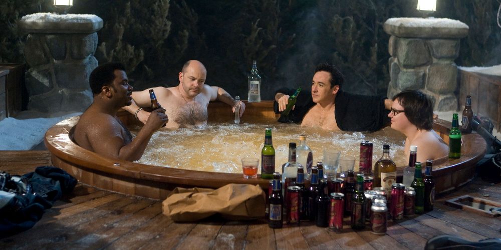 The gang drinks beer in the jacuzzi in Hot Tub Time Machine