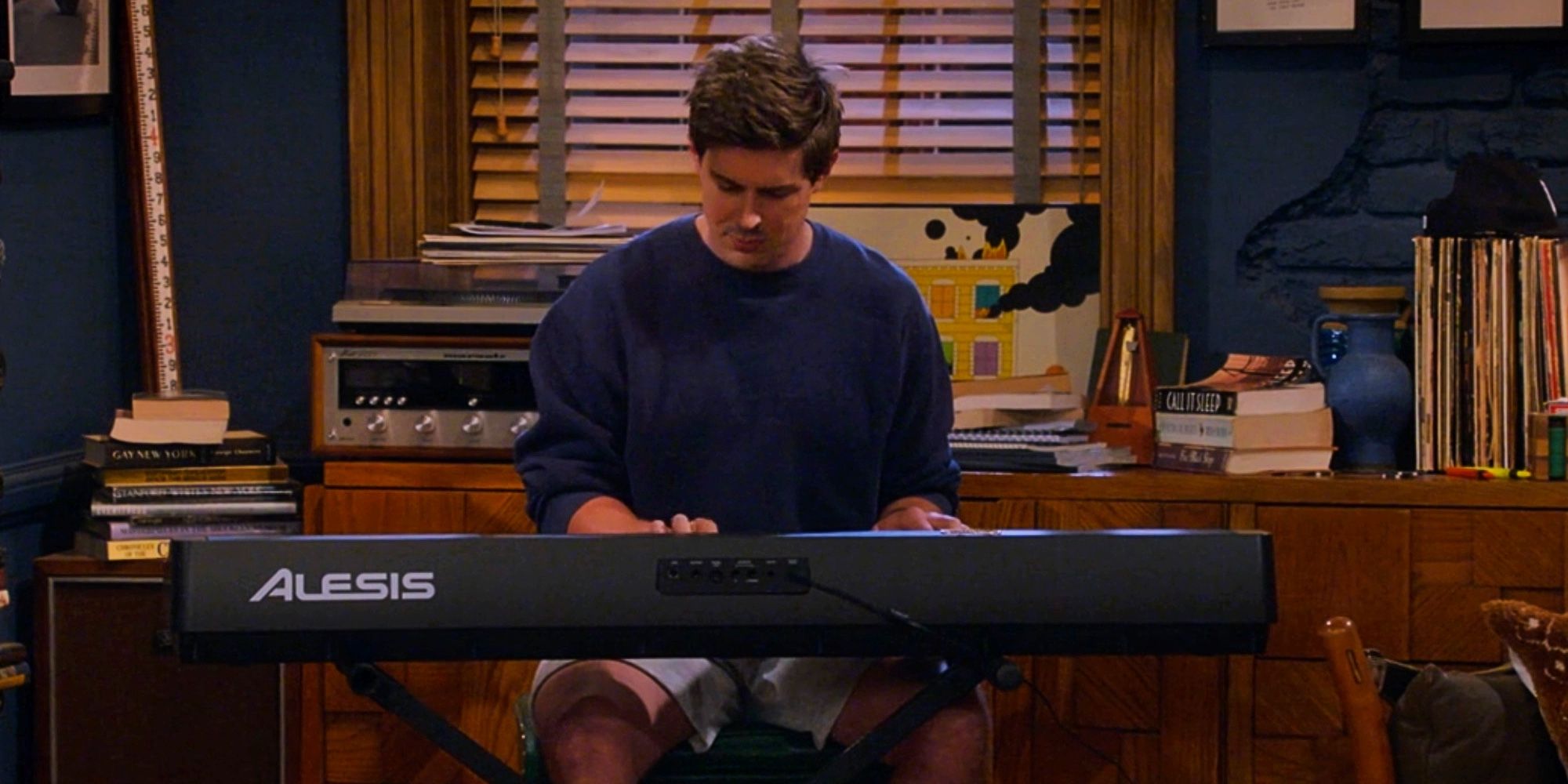 Jesse playing the piano in his apartment on How I Met Your Father.