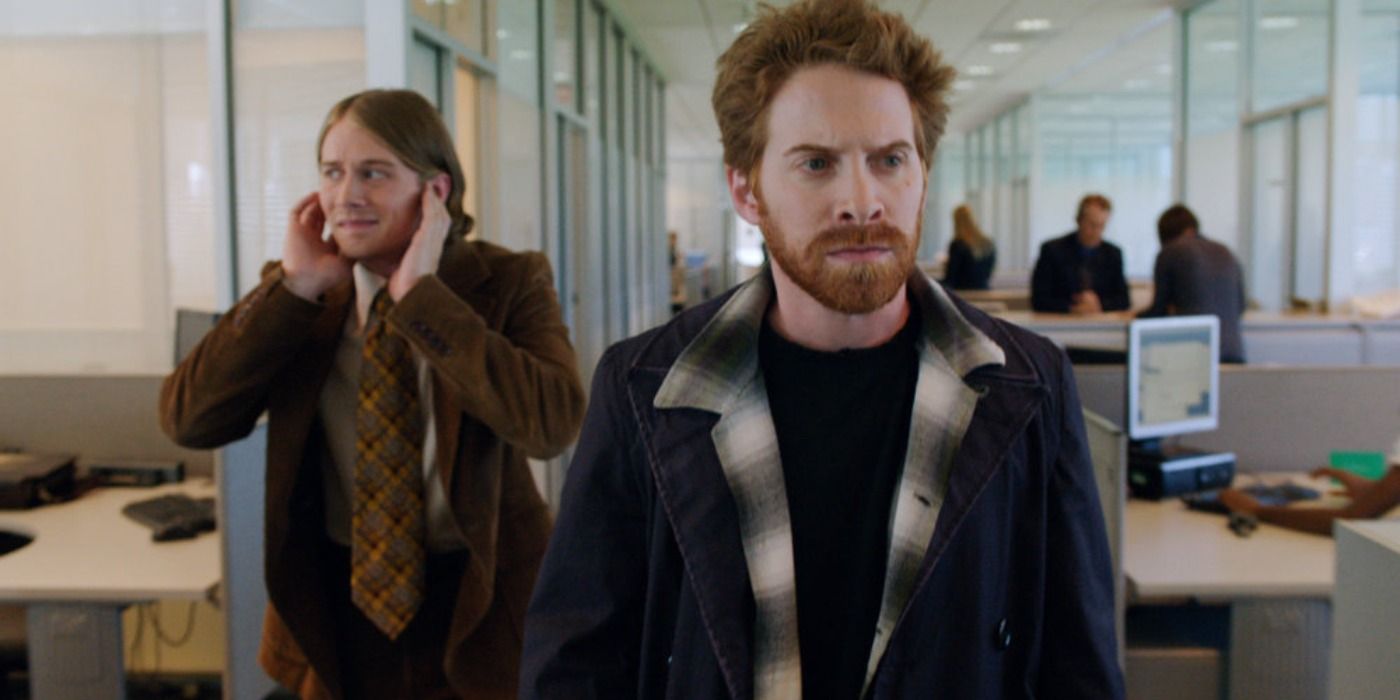 Seth Green annoyed walking through an office in The Story of Luke.