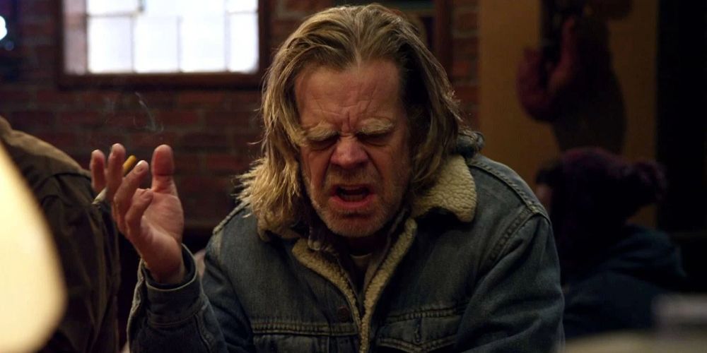 Frank scowls in the bar on Shameless