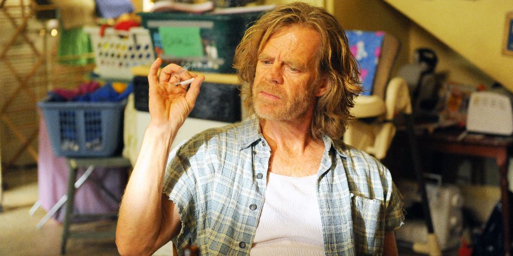 Frank holding a cigarette in Shameless