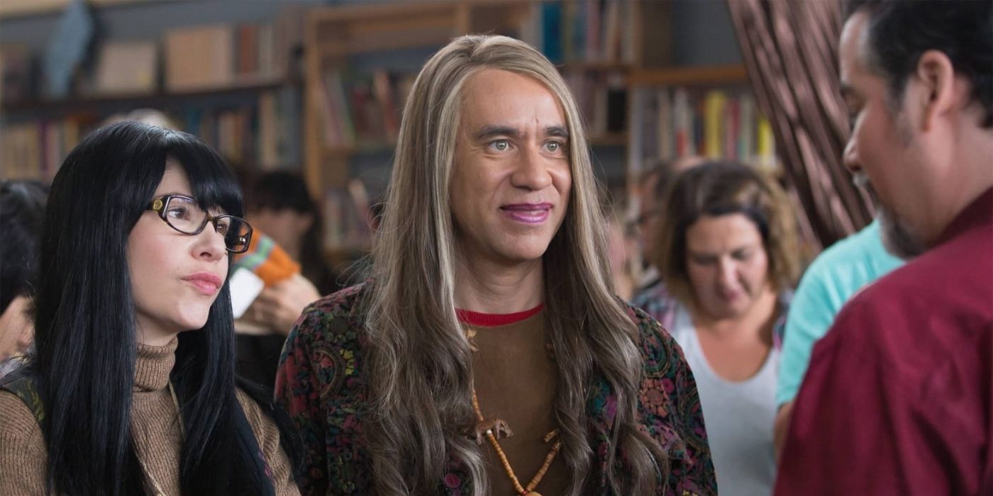 Toni and Candace talking to a man in their bookstore on Portlandia