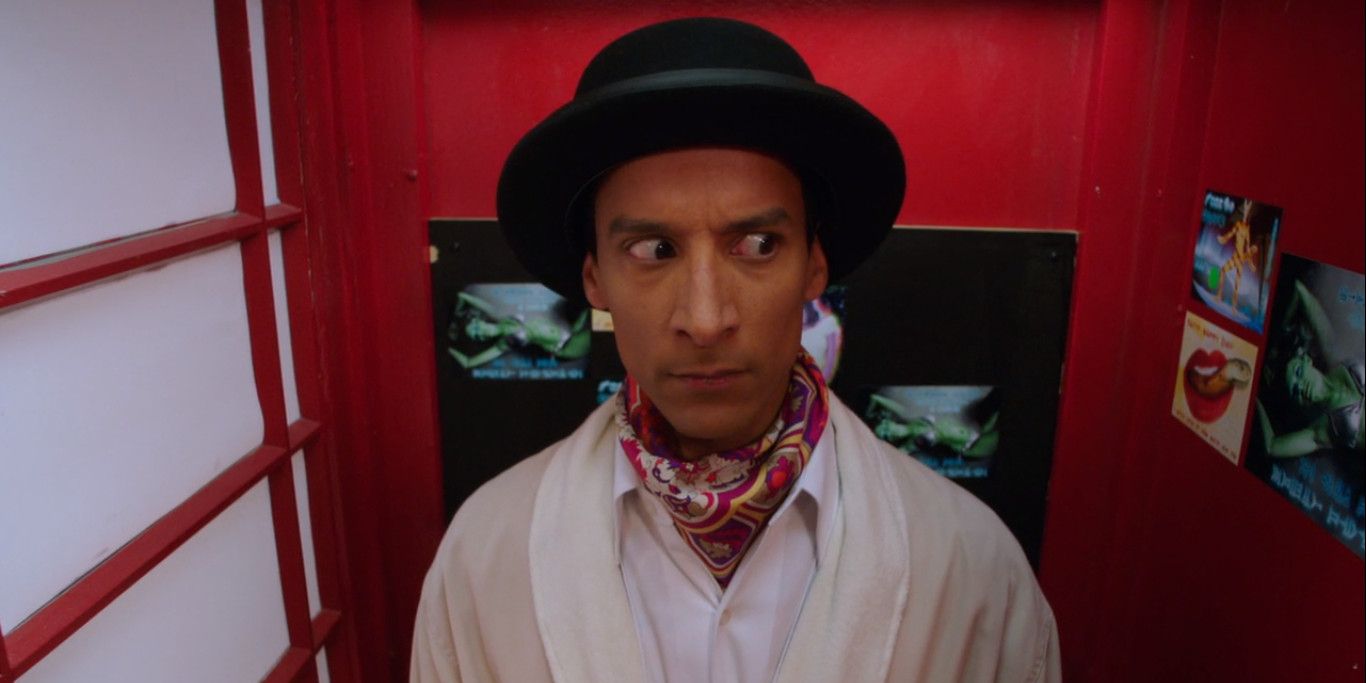Abed Nadir as Inspector Spactime in a red telephone box