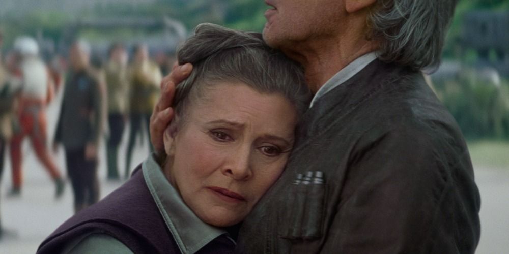 An older Leia and Han Hug