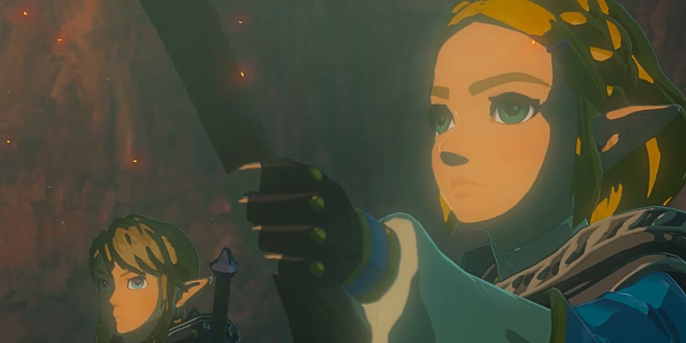 Zelda holding a torch in Tears of the Kingdom's reveal trailer, with Link in the background.