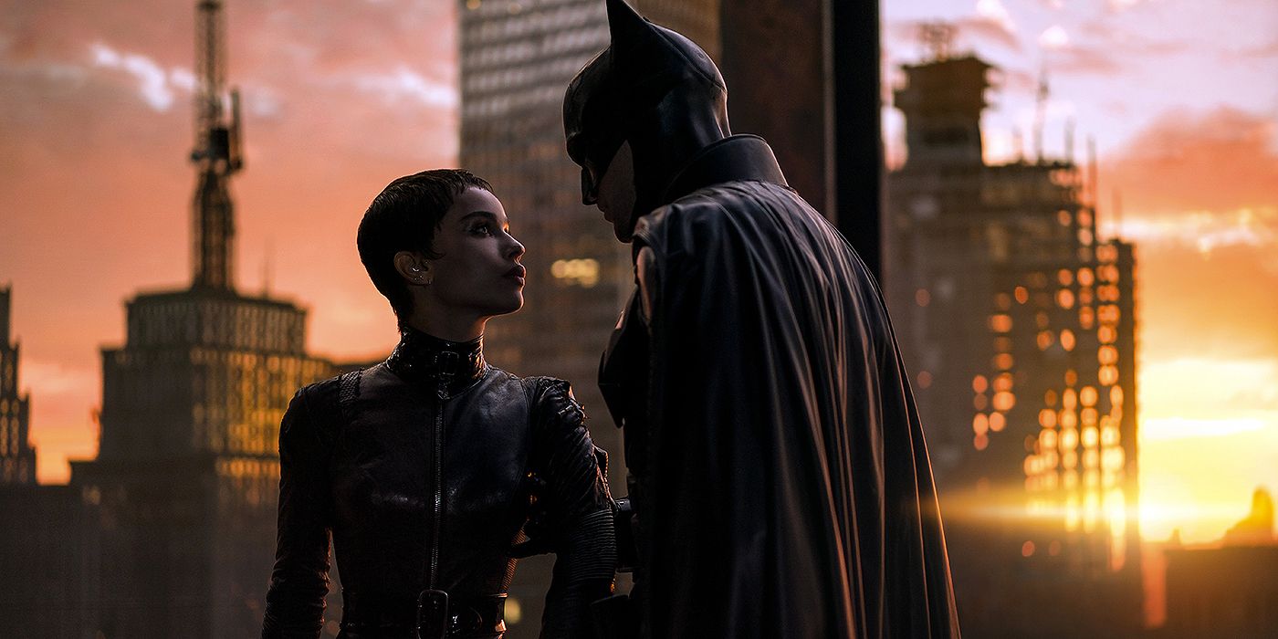Batman talking to Catwoman.