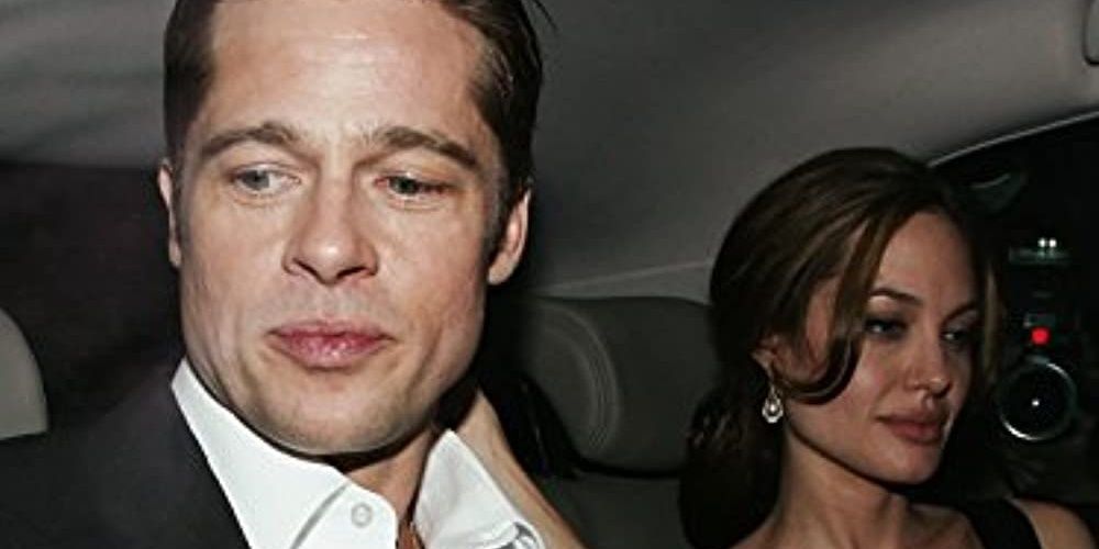 Brad Pitt and Angelina Jolie sitting in a car in Broken The Incredible Story of Brangelina 